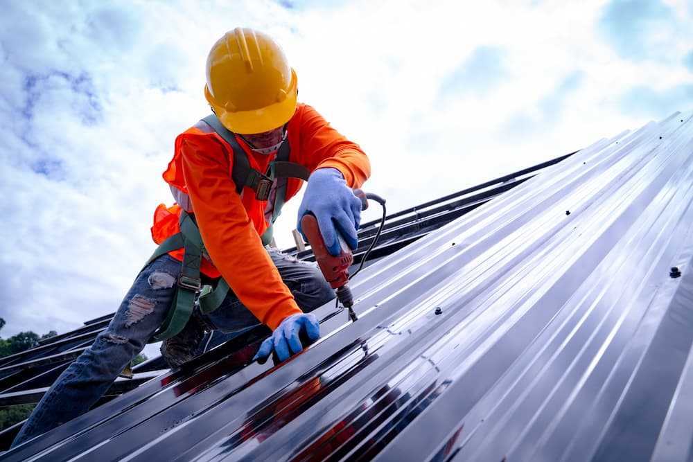 A whitestone participant working at a construction site.